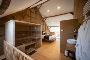 Koupelna v ubytování Paddock Lodge - Suites Wellness & Chambres d'hôtes