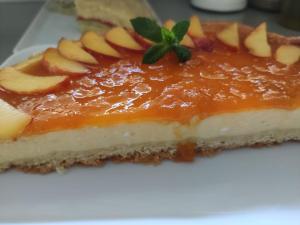 a piece of apple pie on a white plate at ELISEO PALACE TROPEA in Tropea