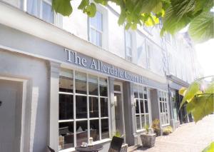 a building with a sign that reads the allegheny conference line at Allerdale Court Hotel in Cockermouth