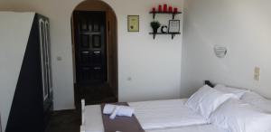 Postel nebo postele na pokoji v ubytování Villa Lucia + 20 fotografií