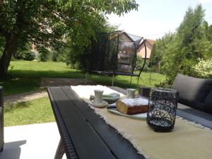 a picnic table with food on top of it at Apartman EL in Sarajevo