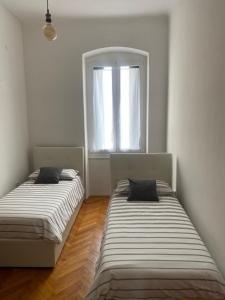 Posteľ alebo postele v izbe v ubytovaní Apartment Porto Poreč