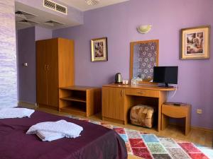 Un pat sau paturi într-o cameră la Guest rooms Sveti Nikola