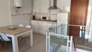 Kuchyň nebo kuchyňský kout v ubytování Apartamento Málaga, en El Palo