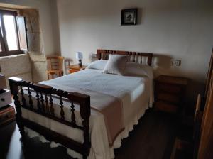 Postel nebo postele na pokoji v ubytování Casa de Xusto