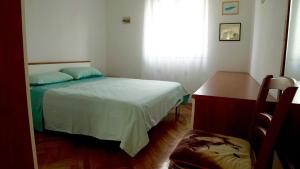 Posteľ alebo postele v izbe v ubytovaní Apartment Shampier near the beach