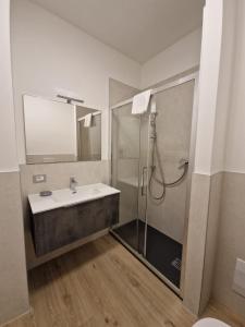 Ein Badezimmer in der Unterkunft San Rocco Apartments - Royal Welcome