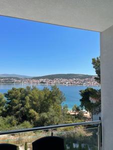 a view of the water from a balcony at A&A Apartments by the sea in Trogir