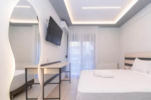 Posteľ alebo postele v izbe v ubytovaní SithoniaRS Luxury Apartment 2nd Floor with Sea View
