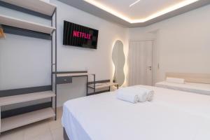 Posteľ alebo postele v izbe v ubytovaní SithoniaRS Luxury Apartment 2nd Floor with Sea View