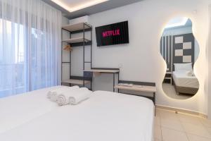 Posteľ alebo postele v izbe v ubytovaní SithoniaRS Luxury Apartment 2nd Floor with Sea View