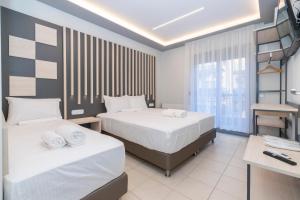 Posteľ alebo postele v izbe v ubytovaní SithoniaRS Luxury Apartment 2nd Floor with Sea View