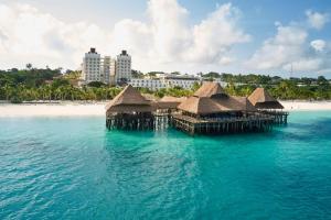 an aerial view of a resort in the ocean at Hotel Riu Jambo - All Inclusive in Nungwi