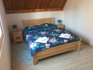 Postel nebo postele na pokoji v ubytování Apartman DoM