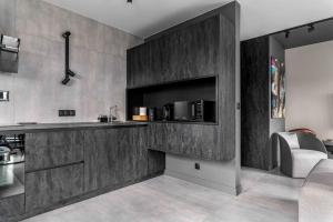 Kuchyňa alebo kuchynka v ubytovaní Niegaleria Apartament + 6 fotografií