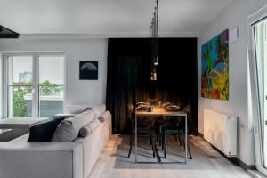 Posedenie v ubytovaní Niegaleria Apartament