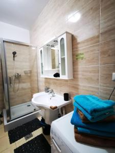 Ванна кімната в Apartament Summernights - Complex Summerland - Mamaia Nord