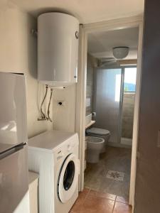 A bathroom at Coralli 8 - Residence Sole Ruju