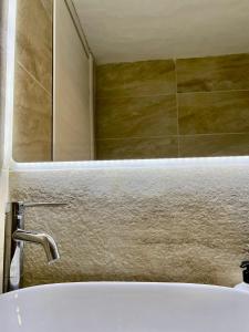 A bathroom at Coralli 8 - Residence Sole Ruju