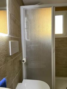 A bathroom at Coralli 8 - Residence Sole Ruju