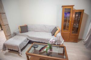 Posezení v ubytování A Central Apartment