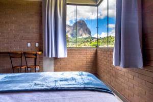 Cama ou camas em um quarto em Villaggio Ronchi