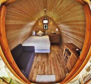 Ein Bett oder Betten in einem Zimmer der Unterkunft Old Thorns Hotel & Resort