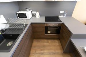 A kitchen or kitchenette at A37 Awesome Apartments