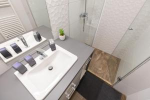 A bathroom at A37 Awesome Apartments