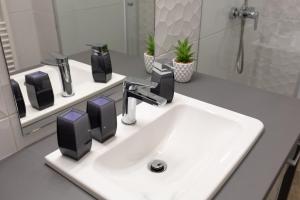 A bathroom at A37 Awesome Apartments