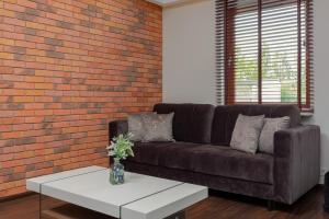Posedenie v ubytovaní Apartment Warsaw Airport Kłobucka by Noclegi Renters