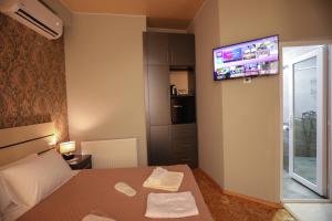 Voodi või voodid majutusasutuse Hotel Sagu toas