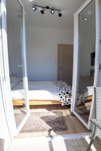 Letto o letti in una camera di JTP Apartmani Ivanjica