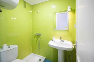 Ein Badezimmer in der Unterkunft Le Family Palms My Home