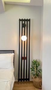Postel nebo postele na pokoji v ubytování Ora Bella Hotel