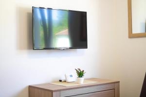 TV o dispositivi per l'intrattenimento presso JTP Apartmani Ivanjica