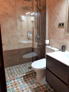 Kúpeľňa v ubytovaní Apartamentos Alcantara