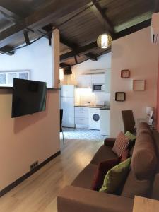 Kuchyňa alebo kuchynka v ubytovaní Apartamentos Alcantara