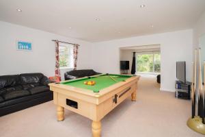 a living room with a pool table in it at Rent My Spa Home with Pool table Hottub and Sauna in Chesterfield
