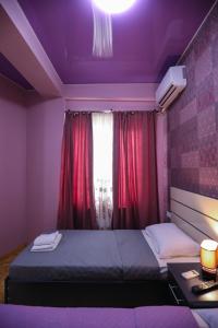 Voodi või voodid majutusasutuse Hotel Sagu toas