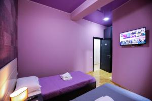 Voodi või voodid majutusasutuse Hotel Sagu toas