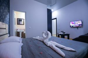 Voodi või voodid majutusasutuse Hotel Sagu toas
