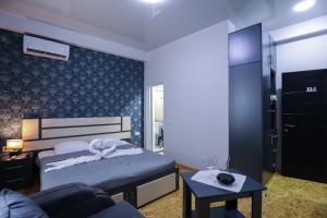 Voodi või voodid majutusasutuse Hotel Sagu toas