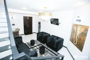 TV a/nebo společenská místnost v ubytování Chamsha Hotel