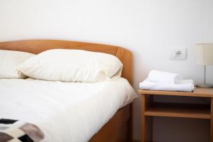 Letto o letti in una camera di JTP Apartmani Ivanjica