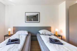 Postel nebo postele na pokoji v ubytování Glück Auf Appartements Schleiermacherstraße Duisburg