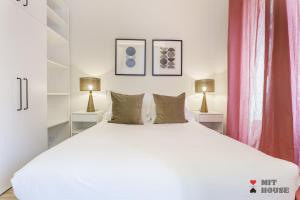 Een bed of bedden in een kamer bij Universidad en Madrid