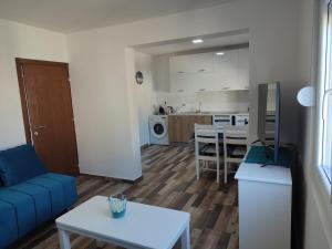 Kuchyň nebo kuchyňský kout v ubytování Apartman DoM