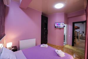 Voodi või voodid majutusasutuse Hotel Sagu toas