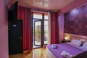 Voodi või voodid majutusasutuse Hotel Sagu toas